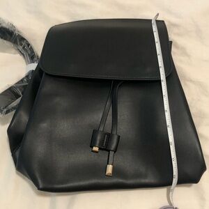Black faux leather backpack gold hardware